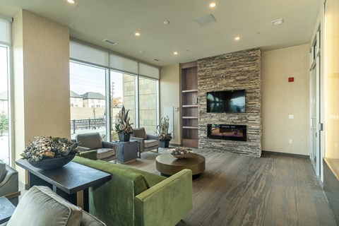 a living room with a fireplace and couches