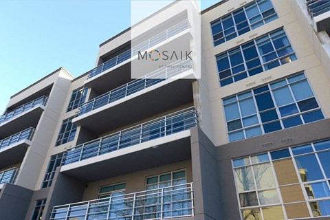 a large building with a sign on the top of it