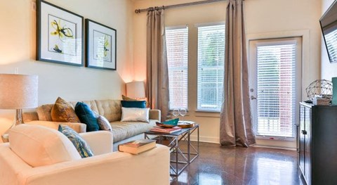 a living room with a couch and a television