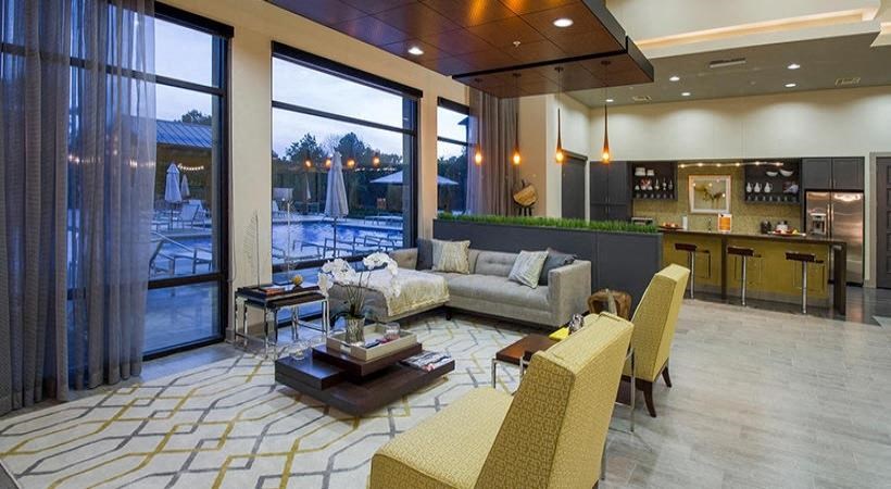 a living room with a couch and a table