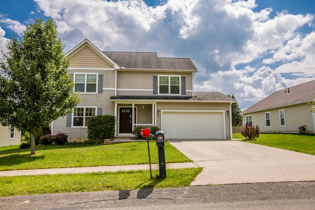 a house with a parking meter in front of it