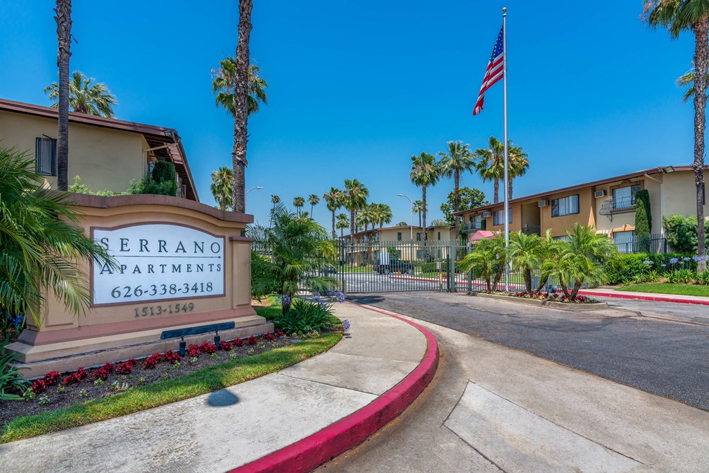 Entrance to complex showing name Serrano Apartments at Serrano Apartments, West Covina