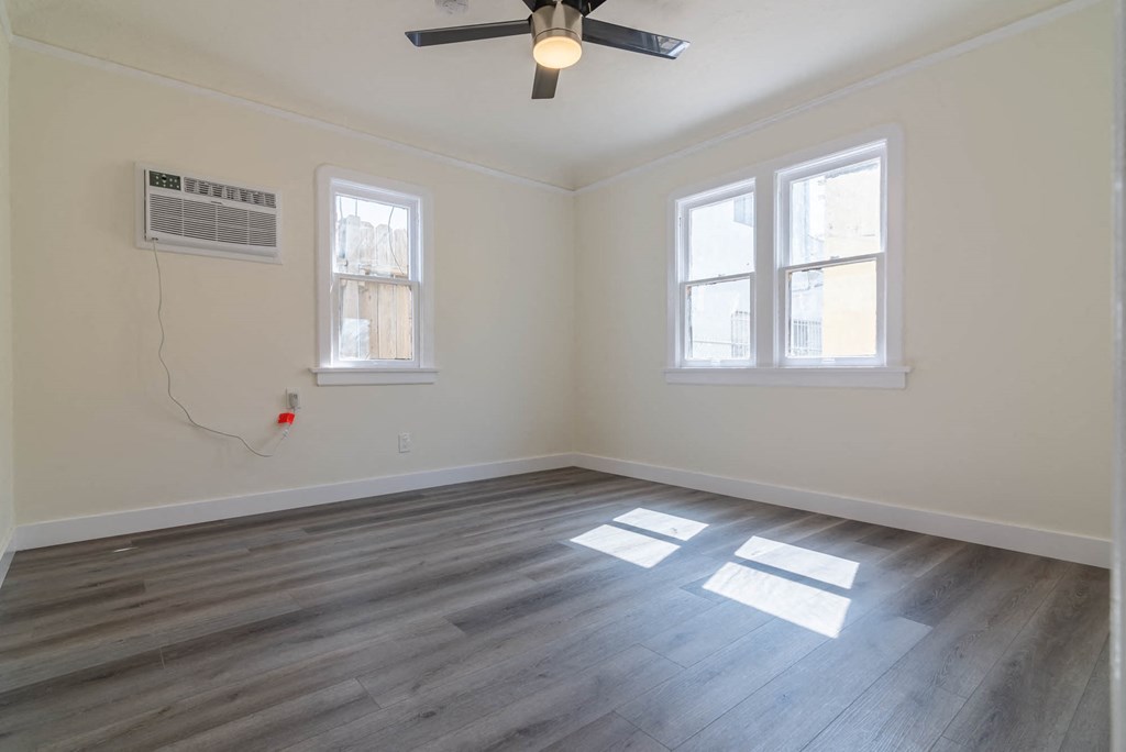Bedroom with three windows