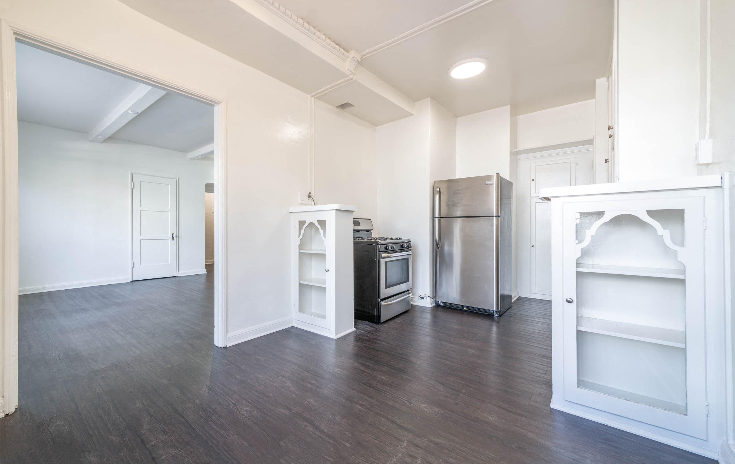 View from dining area of kitchen and living area