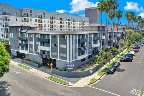 A street view of a residential building named Victoria.