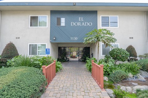 a building with a blue awning with the words el dorado on it
