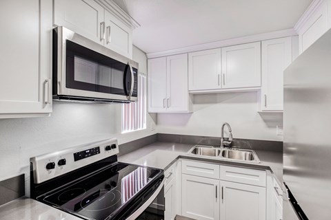 Kitchen with microwave and stove