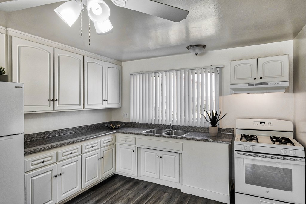Kitchen with modern cabinets at Serrano Apartments, California, 91790