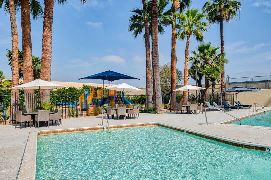 Pool and sitting area at Serrano Apartments, West Covina