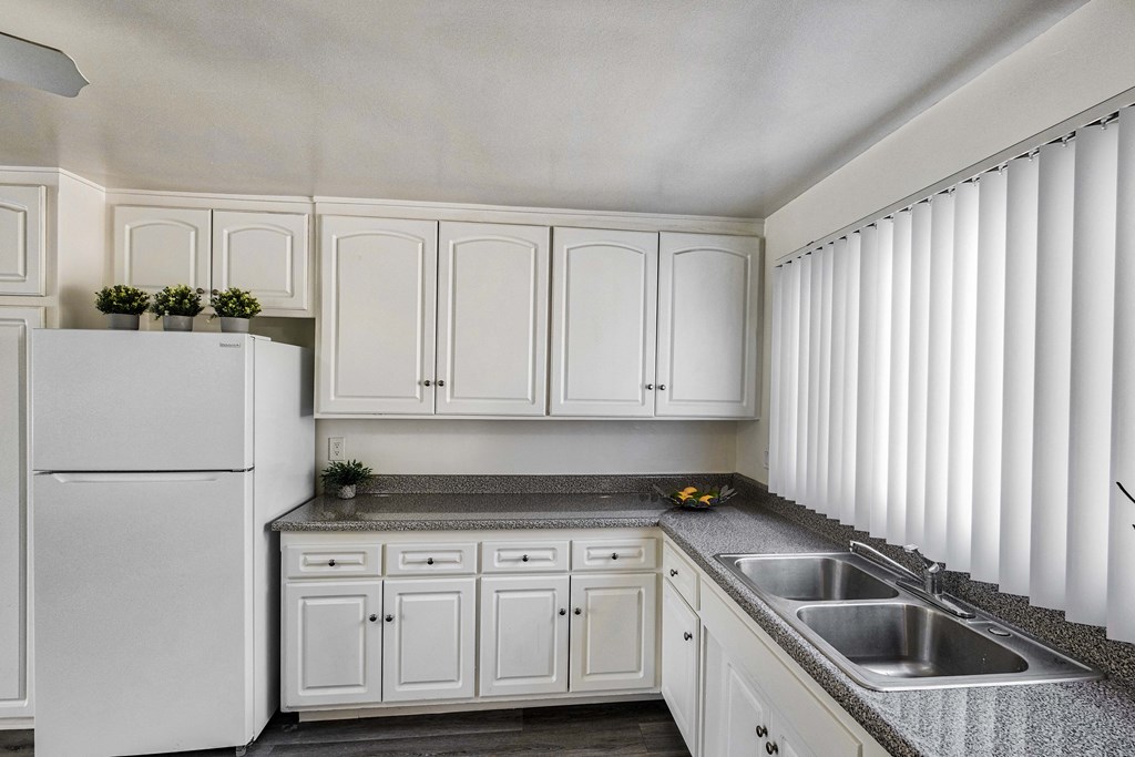 View of Kitchen at Serrano Apartments, West Covina, California