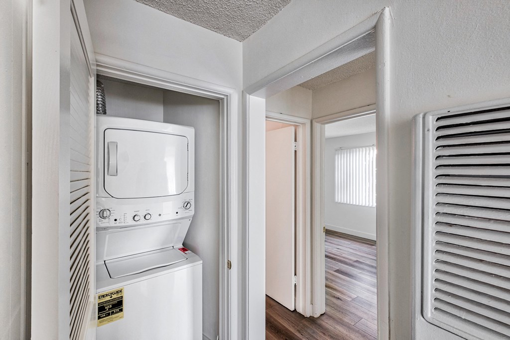 view of Stacked Laundry washer and dryer at Serrano Apartments, West Covina, CA, 91790