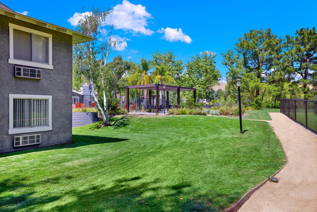 a yard with a house and a gazebo at Monterra Ridge Apartments, California,91351