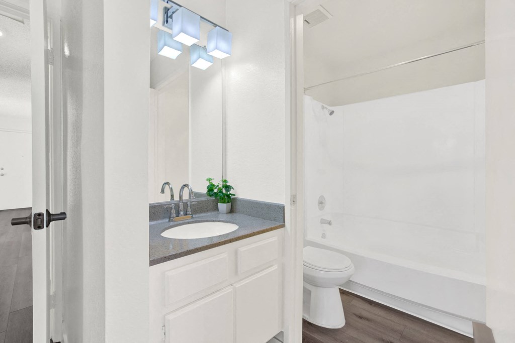a bathroom with a sink and a toilet at Monterra Ridge Apartments, California,91351