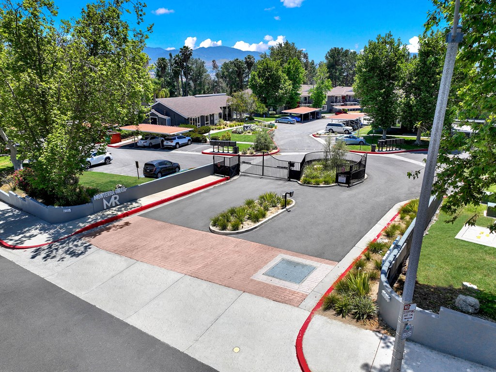 a view of a park with a playground and a parking lot at Monterra Ridge Apartments, California,91351