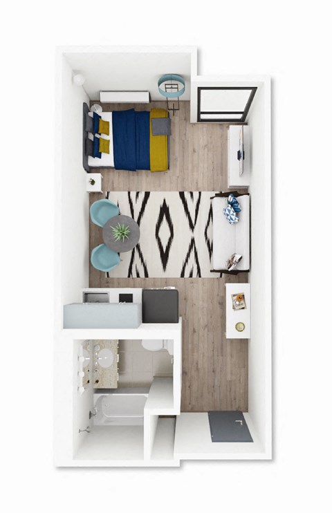 A small room with a bed, desk, and chair.