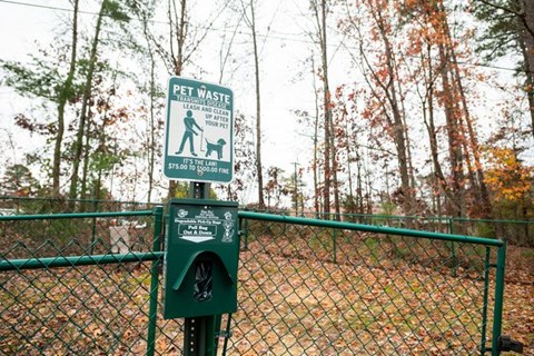 A sign for pet waste disposal