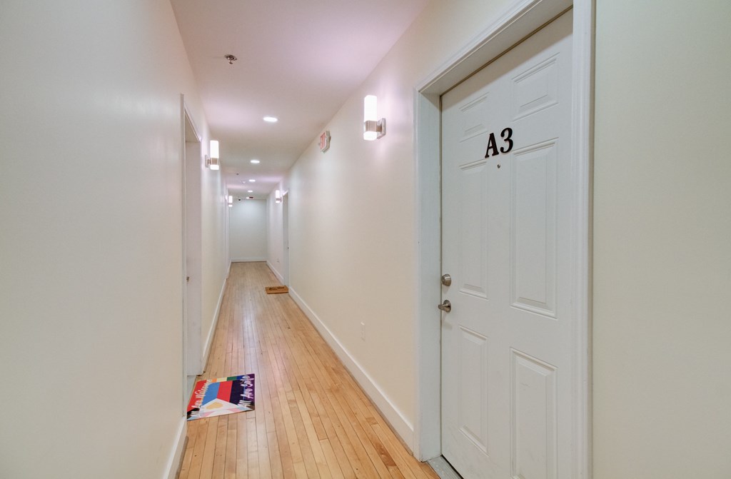 A hallway with a door labeled A3 on the right.