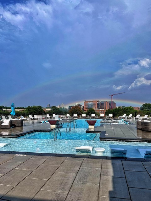 a rainbow over the pool