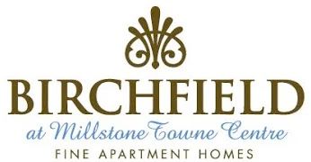 A logo for Birchfield at Millstone Grange Centre, a fine apartment homes.