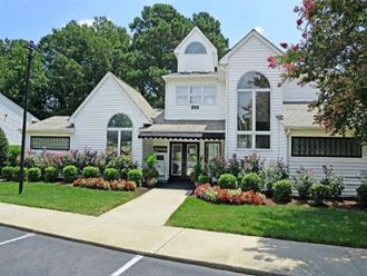 Driveway view of leasing office and Clubhouse Driveway view of leasing office and Clubhouse at Huntington Apartments, Morrisville, NC