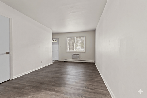 A room with a door and a window.