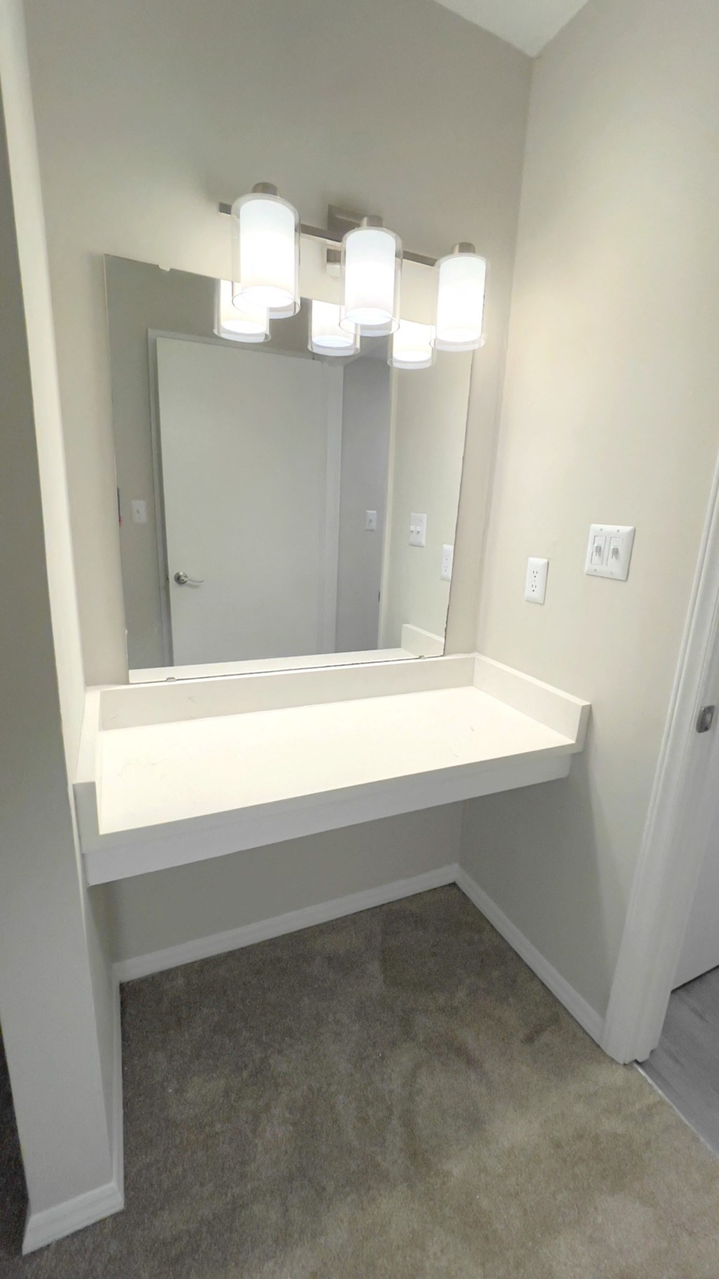 Vanity with mirror and lighting  at Huntington Apartments, Morrisville, 27560