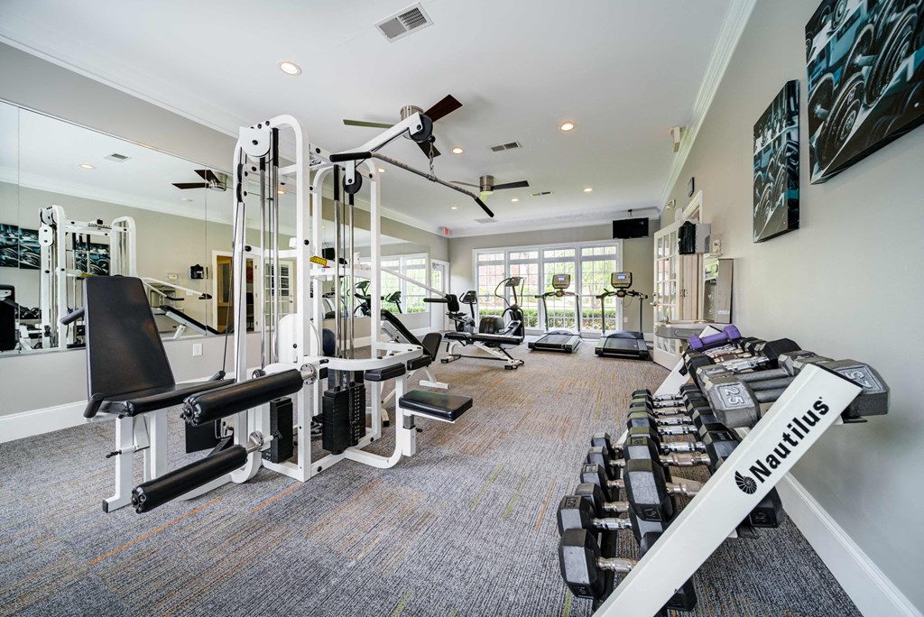 Fitness Center with Free Weights, Treadmills, Elliptical, Recumbent Bike, and Weight Training Machine