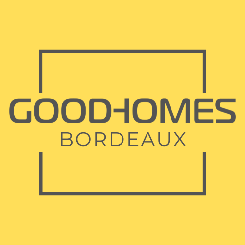 A yellow sign with the words "Good-Homes Bordeaux" written in black.
