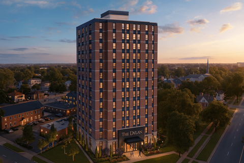 The Dylan hotel is a tall building with a parking lot in front.