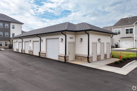 A row of garage doors are numbered 1471.