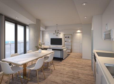 A modern dining room with a large table and chairs.