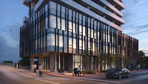 A modern building with a glass facade is depicted in the image.