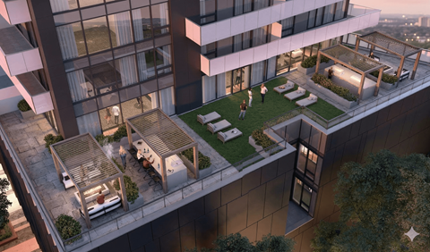 A modern building with a rooftop garden and seating area.