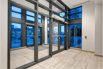 A set of double doors with a glass window on the left side.