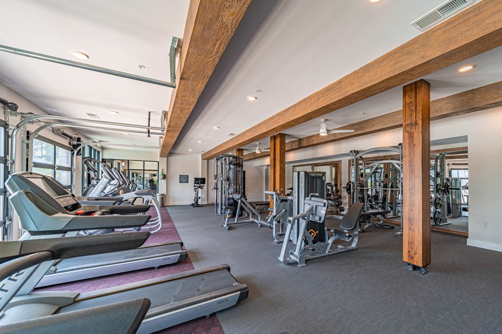 a gym with treadmills and other exercise equipment at Preston Ridge, Hickory, NC 28602