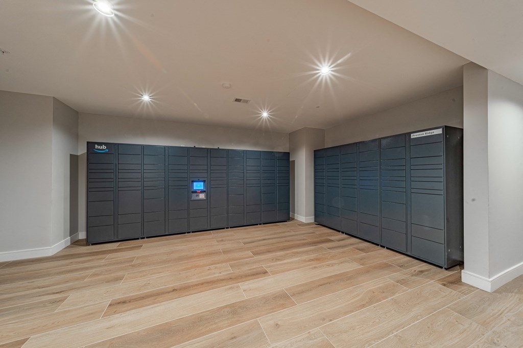a large room with two rows of lockers at Preston Ridge, Hickory