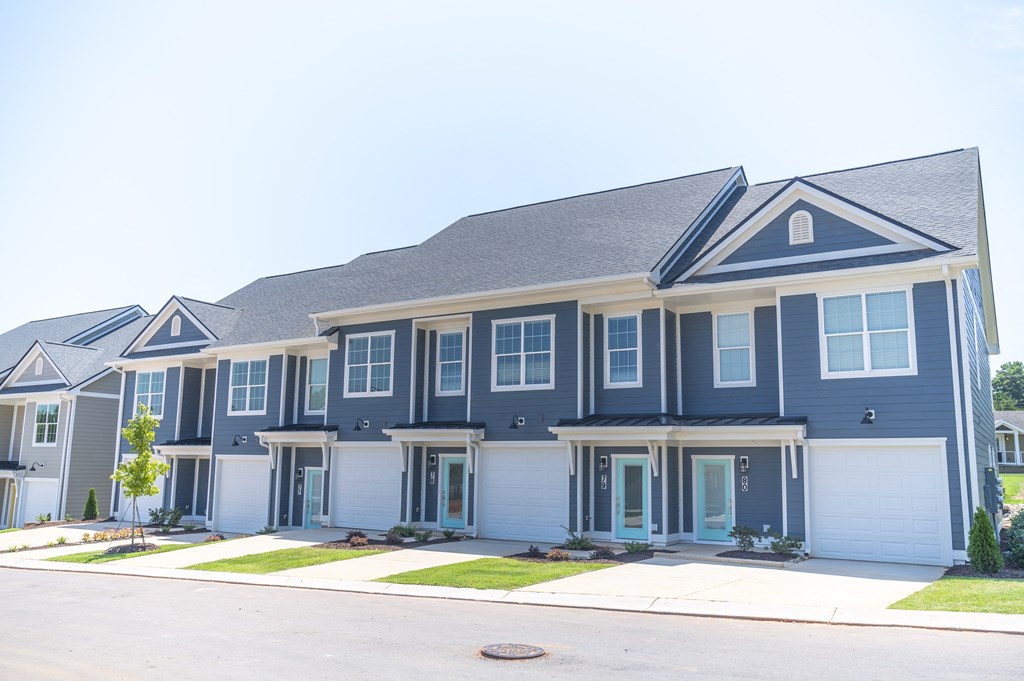 a row of houses on a street at Landon Green Artisan Cottages Apartments, Hickory, NC