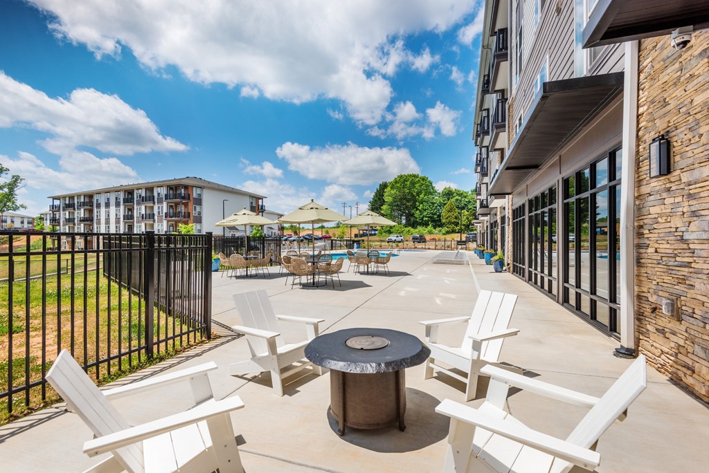 the preserve at ballantyne commons courtyard patio with chairs and tables and