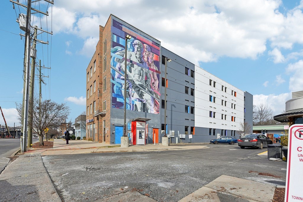 A large building with a mural on the side of it.