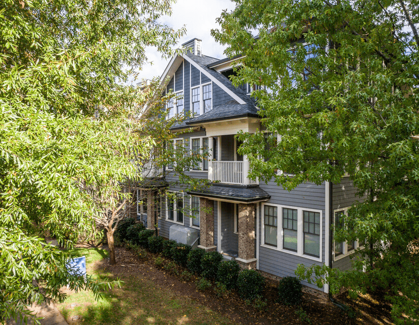 House with a grey roof and white trim.