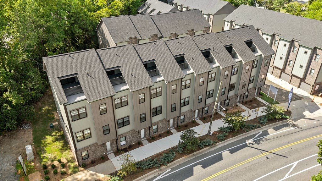 an aerial view of an apartment building on a city street at The Collection Charlotte in Charlotte, NC, 28205
