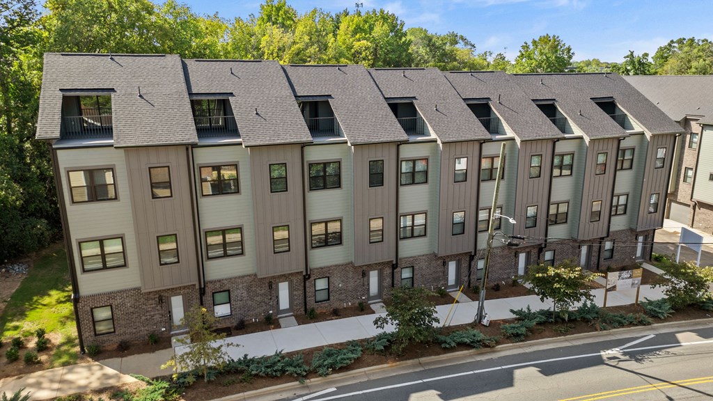 an aerial view of an apartment building with many windows at The Collection Charlotte in Charlotte, NC, 28205