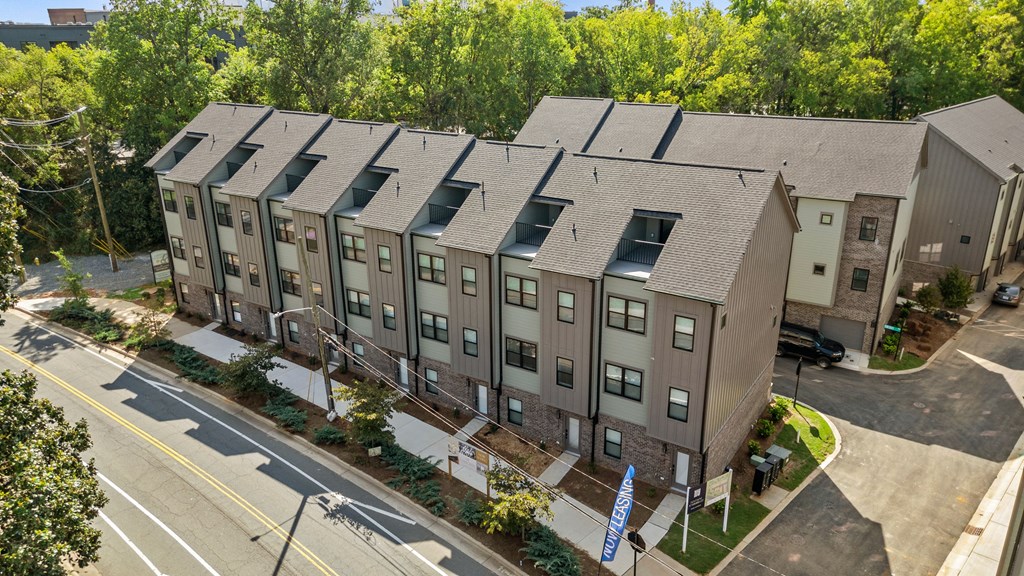 an aerial view of an apartment building with a street in front of it at The Collection Charlotte in Charlotte, NC, 28205