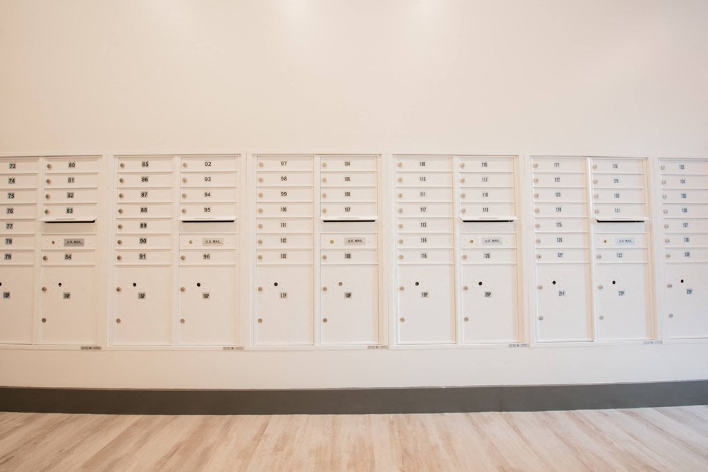 a row of lockers in a white room