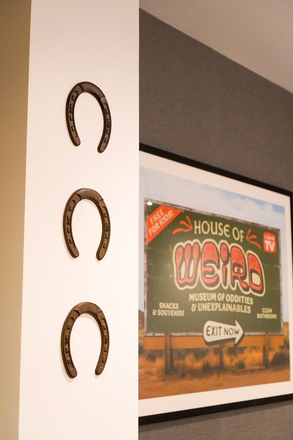 A poster for the House of Weird Museum of Oddities and Unexplainables.