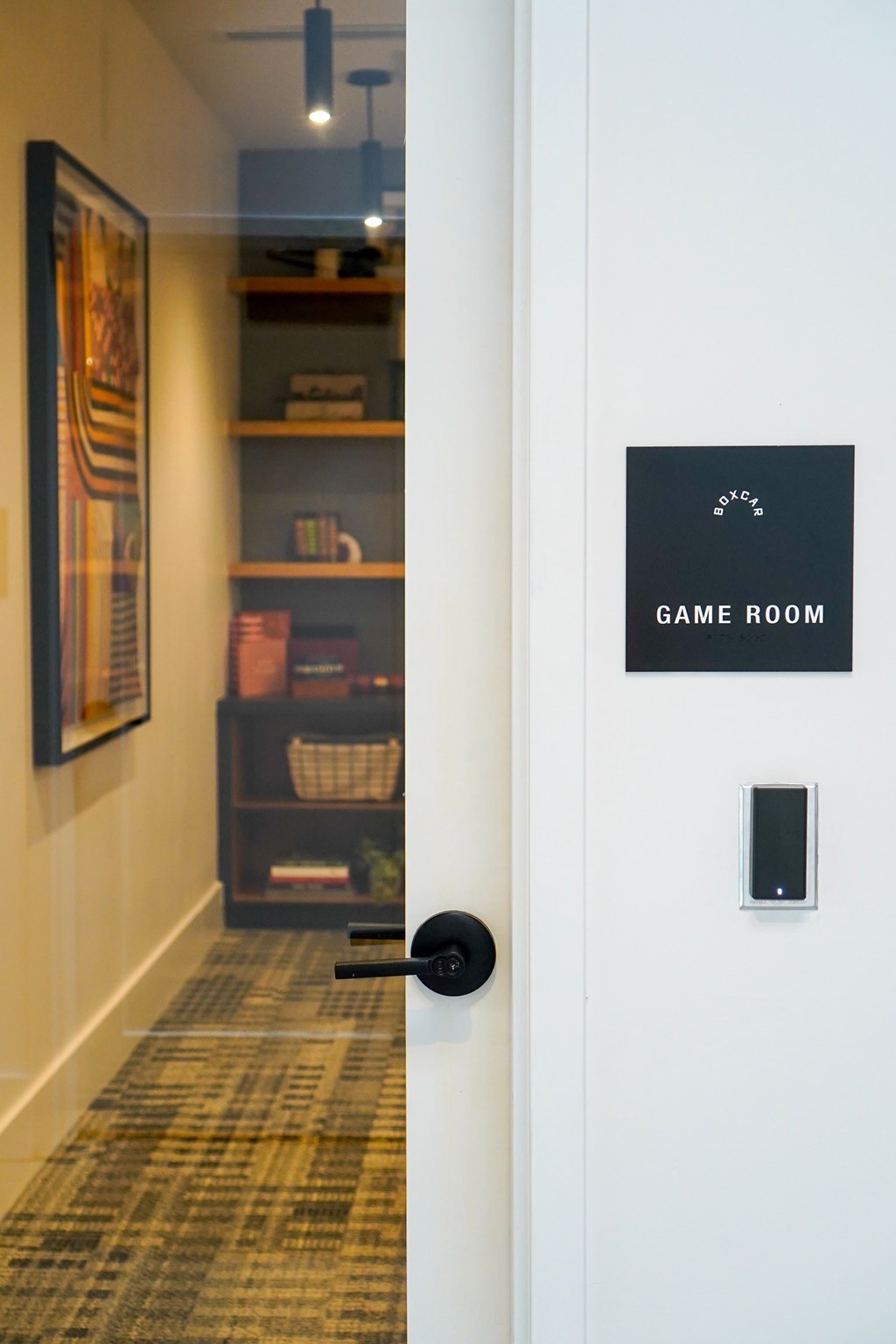 A door with a sign that says Game Room.