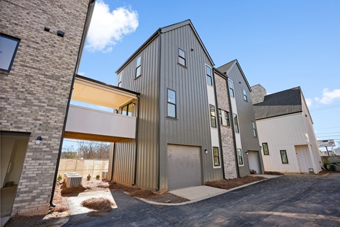A modern building with a mix of materials including wood and metal.