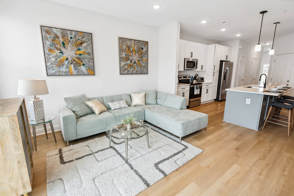 a living room with a couch and a table