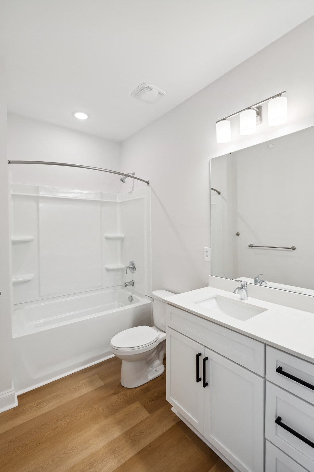 a bathroom with a sink toilet and a shower