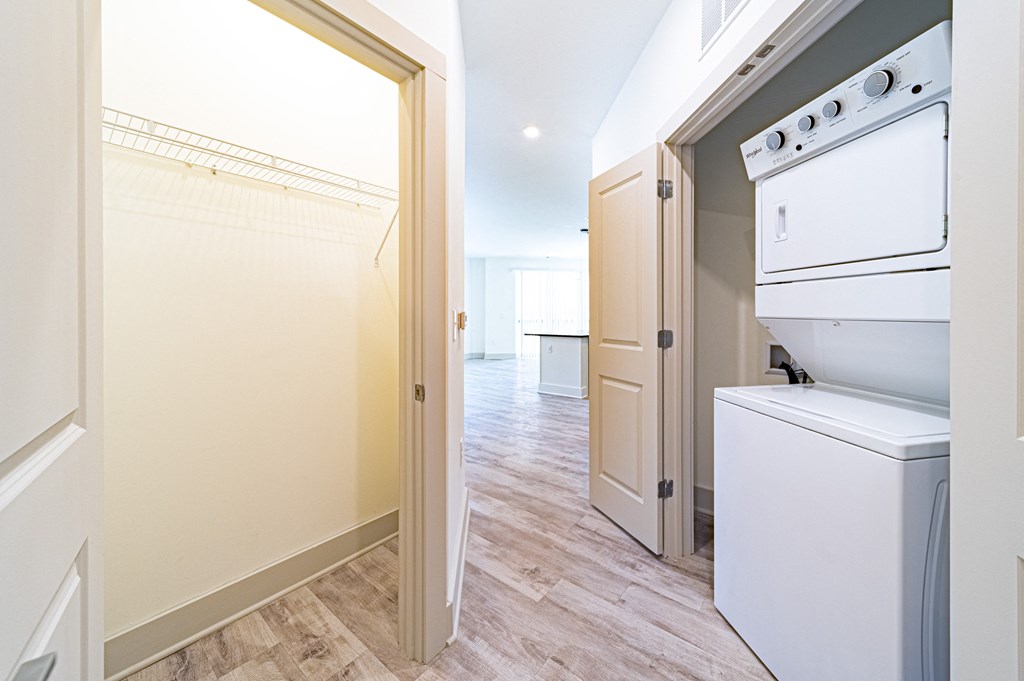 a laundry room with a washer and dryer